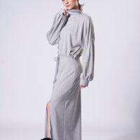 jogger skirt set, maxi skirt with drawstring waist, above knee split, long sleeve top with high zip neckline and loose fitting sleeves.